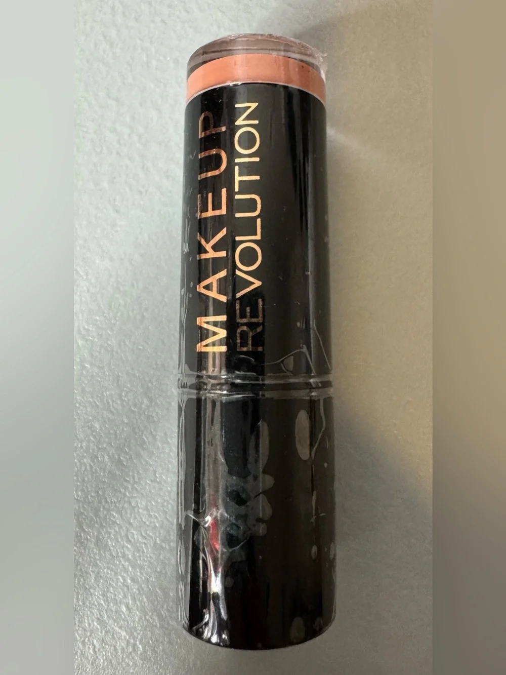 Makeup Revolution lipstick in love nude Soft Peachy Nude